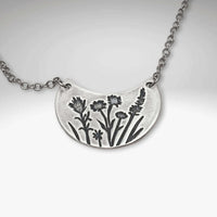 Beautiful Wildflower Basket Necklace featuring intricate floral designs, inspired by spring and summer blooms.