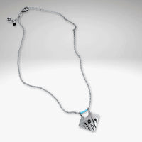 Wildflower Box Necklace featuring Indian Paintbrush and Wild Lupine with a matte silver finish and colored stones.