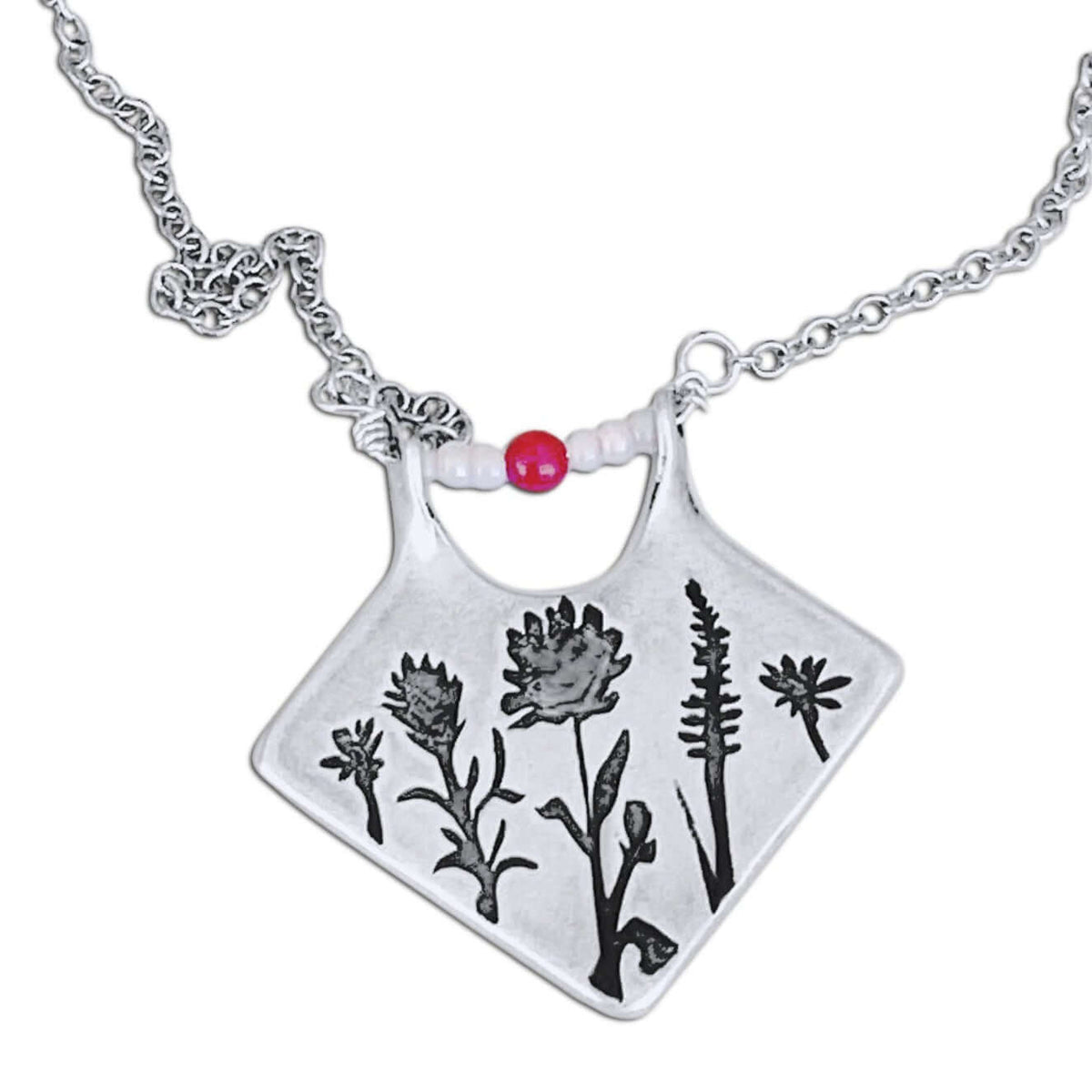 Wildflower Box Necklace featuring a matte silver finish with intricate floral designs and pink stones, perfect for any occasion.