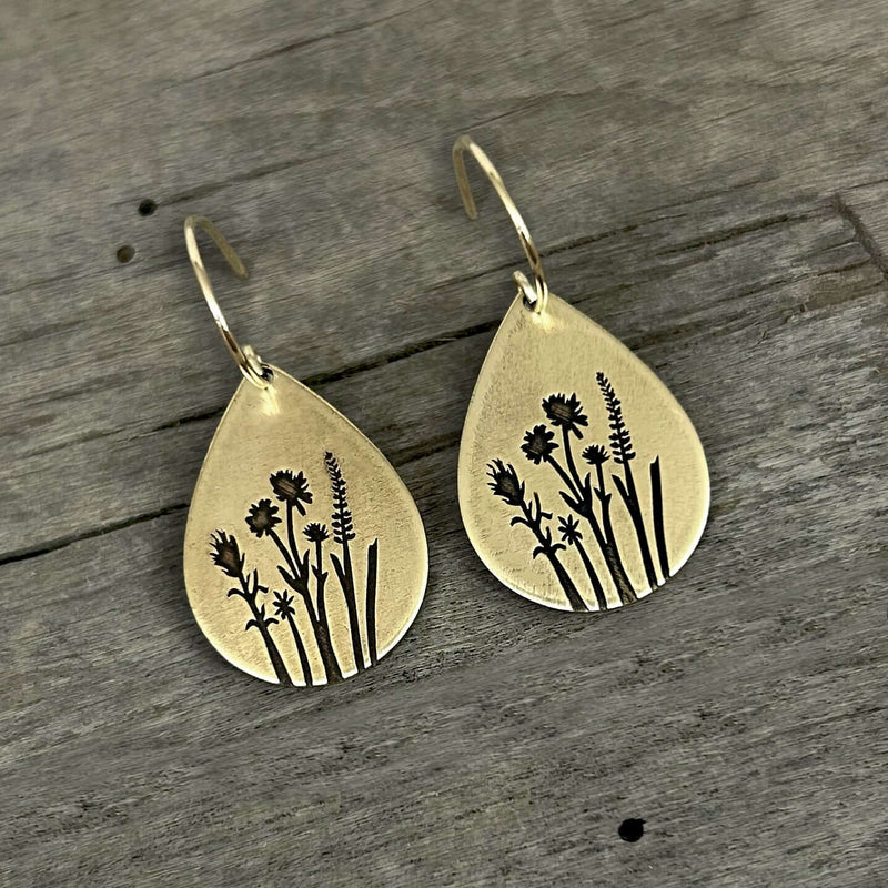 Wildflower Earrings featuring etched designs of Indian Paintbrush and Wild Lupine on a teardrop shape.