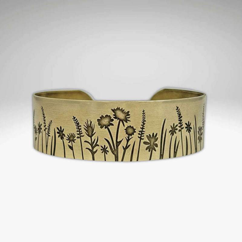 Wildflower Field Cuff featuring intricate wildflower designs in a beautiful bracelet.