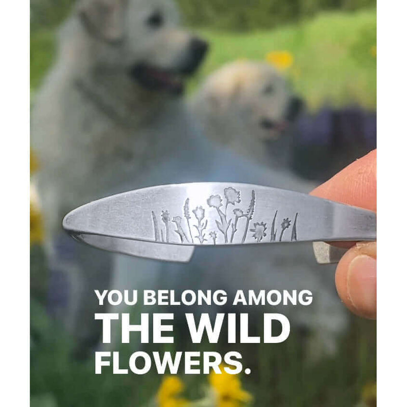 Wildflowers Signet Cuff featuring floral design with dogs in background and text 'You belong among the wild flowers'.