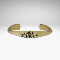 Wildflowers Signet Cuff featuring detailed floral designs of Indian Paintbrush, Wild Lupine, and Balsamroot.