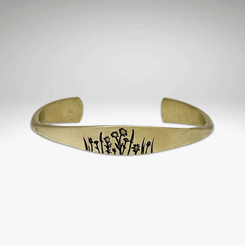 Wildflowers Signet Cuff featuring detailed floral designs of Indian Paintbrush, Wild Lupine, and Balsamroot.
