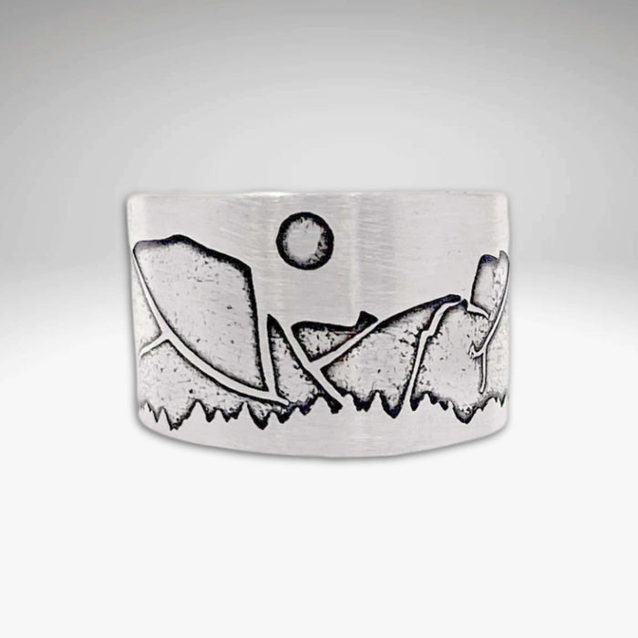 Yosemite Adjustable Ring showcasing iconic mountain landscape and sun design in a sleek silver finish.