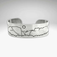 Yosemite Cuff Bracelet featuring intricate engraved design of Yosemite scenery including El Capitan and Half Dome.