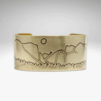 Yosemite Wide Cuff Bracelet- with engraved mountain and sun design in antique brass finish, adjustable width