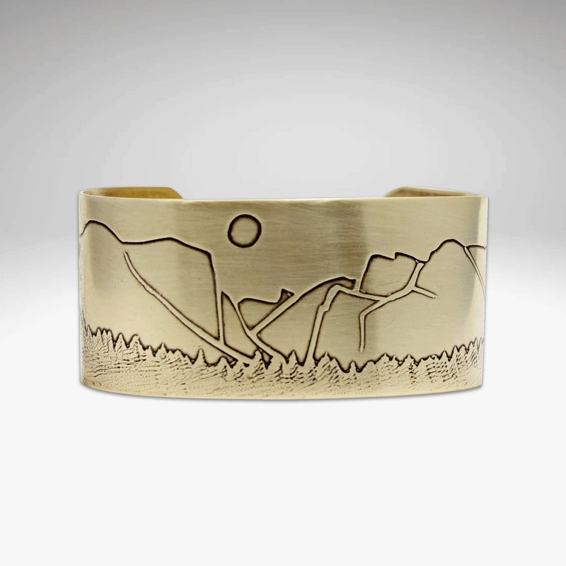 Yosemite Wide Cuff Bracelet- with engraved mountain and sun design in antique brass finish, adjustable width