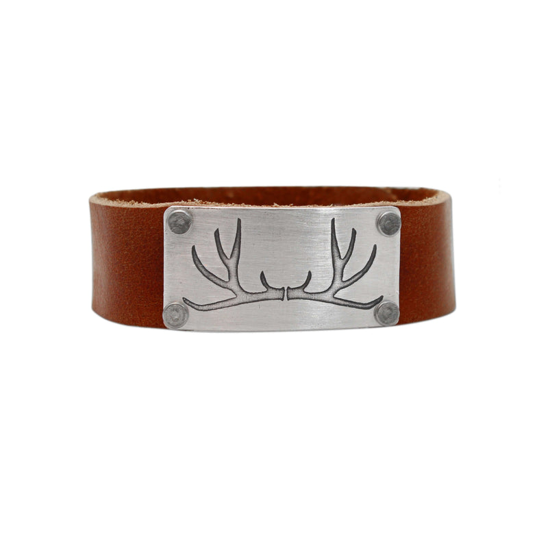 Leather cuff bracelet with antler design in matte silver finish