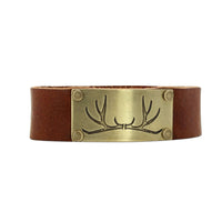 Leather cuff bracelet with antler design in matte silver finish