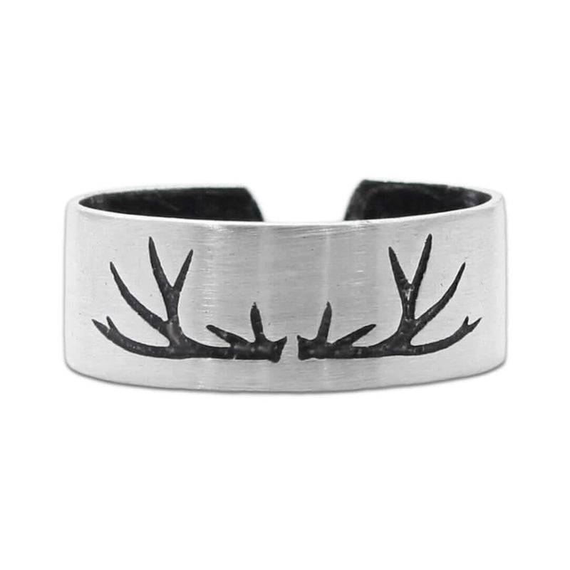 Leather cuff bracelet with antler design in matte silver finish