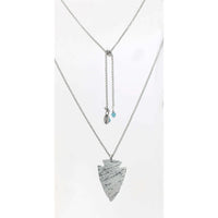 Arrowhead Long Layered Necklace featuring a hammered arrowhead pendant on a silver adjustable cable chain.