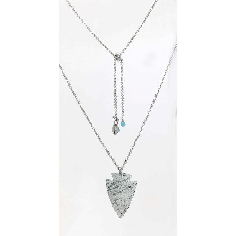 Arrowhead Long Layered Necklace featuring a hammered arrowhead pendant on a silver adjustable cable chain.