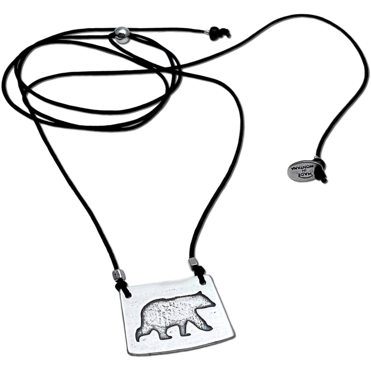 Bear Boy Necklace with bear silhouette on adjustable cord, perfect for outdoor enthusiasts.