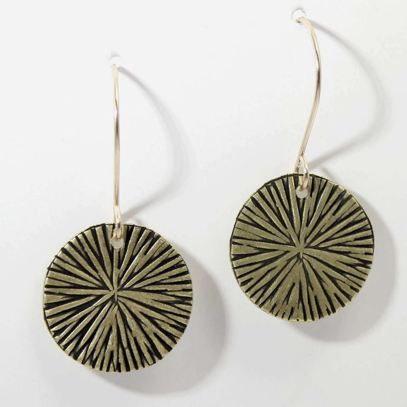 Blossom Earrings featuring a modern design with textured discs in antique brass, perfect for nature lovers.