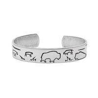 Buff and Babes Cuff Bracelet showcasing a silver design with bison silhouettes on a sleek cuff.