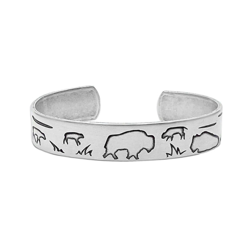 Buff and Babes Cuff Bracelet showcasing a silver design with bison silhouettes on a sleek cuff.