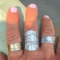 Buff in the Tetons Adjustable Ring showcasing the Grand Tetons and buffalo designs on three unique rings.