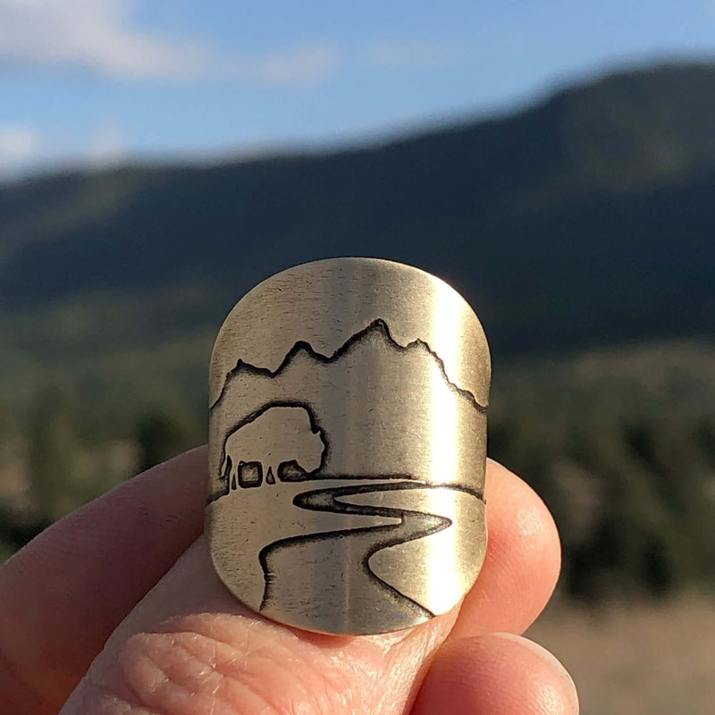 Buff in the Tetons Adjustable Ring with a silhouette of mountains, buffalo, and a river.