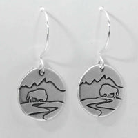 Buffalo in the Tetons Earring design featuring a bison and mountains on solid brass, finished in matte silver.