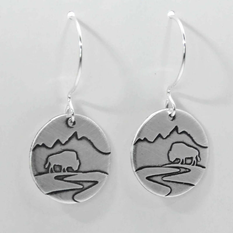 Buffalo in the Tetons Earring design featuring a bison and mountains on solid brass, finished in matte silver.