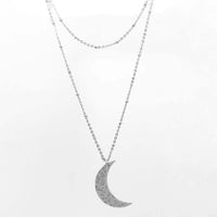 Crescent Long Layered Necklace featuring a crescent moon pendant in matte silver finish.