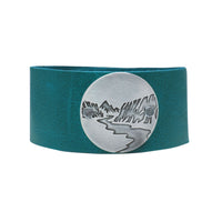 Echo Leather Cuff Bracelet featuring a scenic design on a teal leather band.