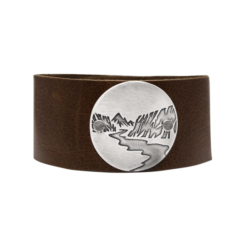 Echo Leather Cuff Bracelet featuring a detailed landscape design in silver on an espresso leather band.