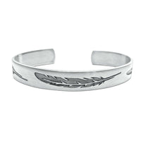 Feather Cuff Bracelet in matte silver showcasing intricate feather designs, perfect for outdoor activities.