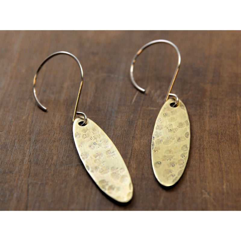 Fog Drop Earrings in antique brass with textured finish hanging from gold-filled earwires.