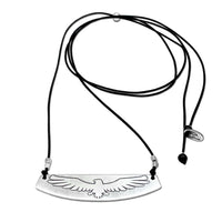 Freebird Necklace featuring a solid brass pendant with etched eagle design and adjustable cord.