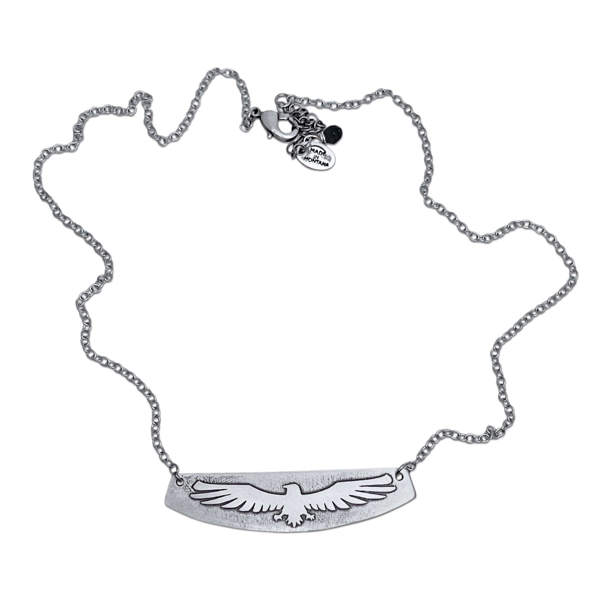 Freebird Necklace featuring a solid brass eagle pendant on an adjustable cable chain, symbolizing freedom.
