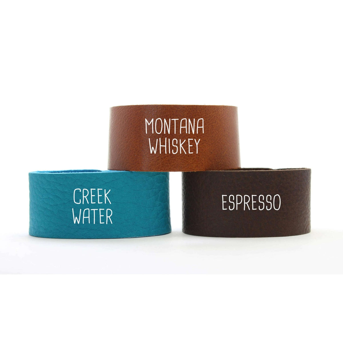 Going to the Sun Road Leather Cuff in Montana Whiskey, Creek Water, and Espresso colors.