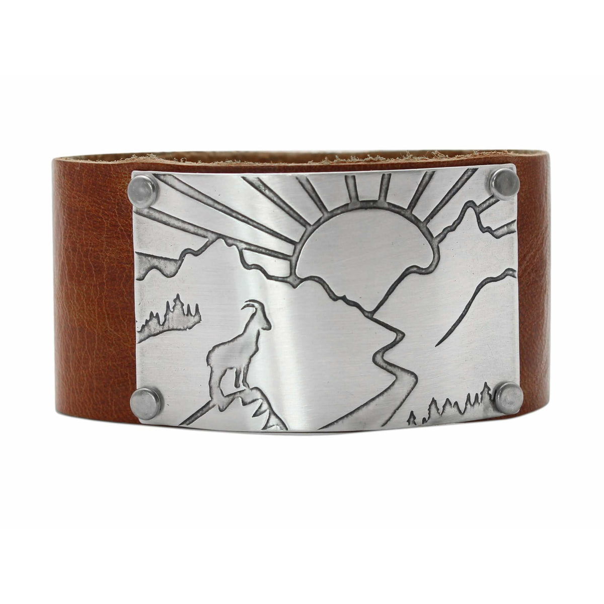 Going to the Sun Road Leather Cuff featuring a mountain goat and sun design on adjustable leather.