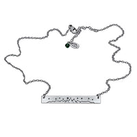High Alpine Necklace with etched mountain design and adjustable cable chain in silver finish.