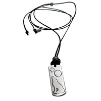 Howl Necklace featuring wolf, moon, and star design on an adjustable black cord.