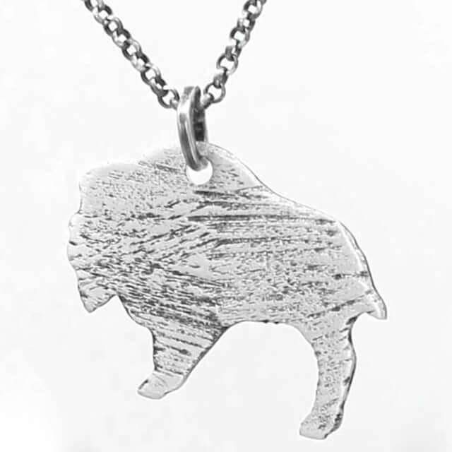 Just Roaming Long Layered Necklace featuring a hammered bison silhouette charm.