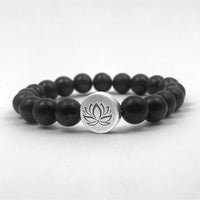 Lotus Stretch Bracelet - Gemstone Beaded Stretchy Bracelet featuring black beads and a lotus emblem charm.