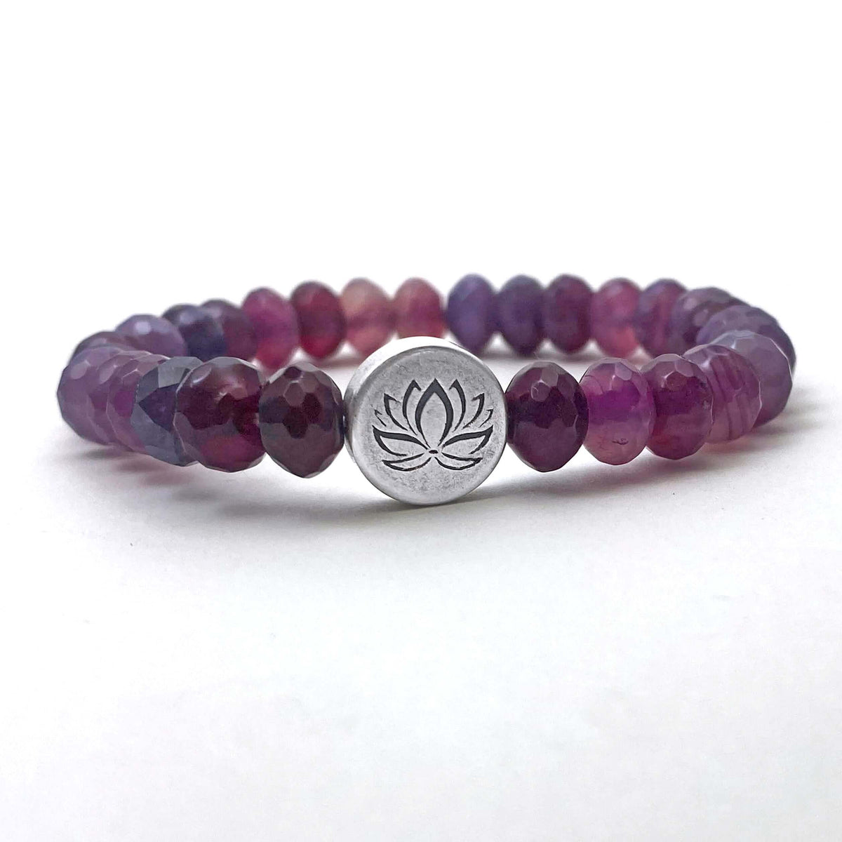 Lotus Stretch Bracelet - Gemstone Beaded Stretchy Bracelet featuring a lotus charm and gemstone beads in purple shades.