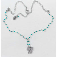 Montana Lariat Necklace featuring a Montana State outline in silver on a turquoise beaded chain.