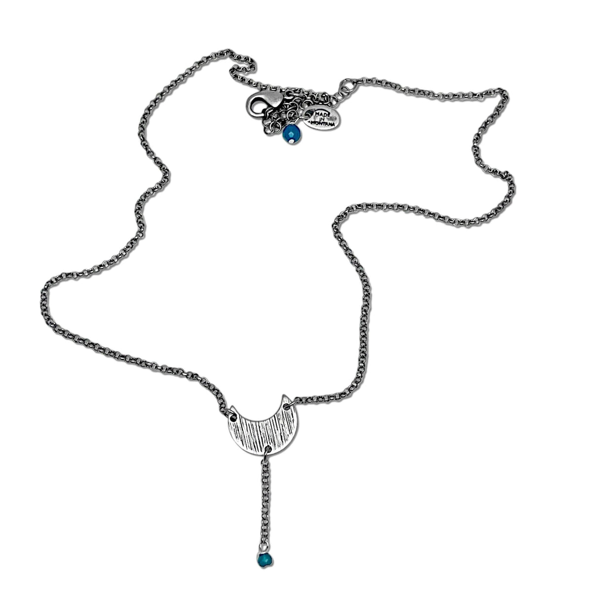 Moonbeam Y Necklace featuring a unique textured design resembling the Moon's topography, handmade in Montana.