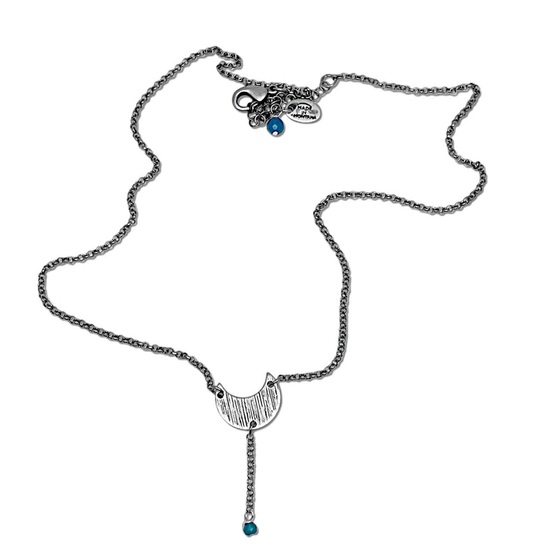 Moonbeam Y Necklace featuring a unique textured design resembling the Moon's topography, handmade in Montana.