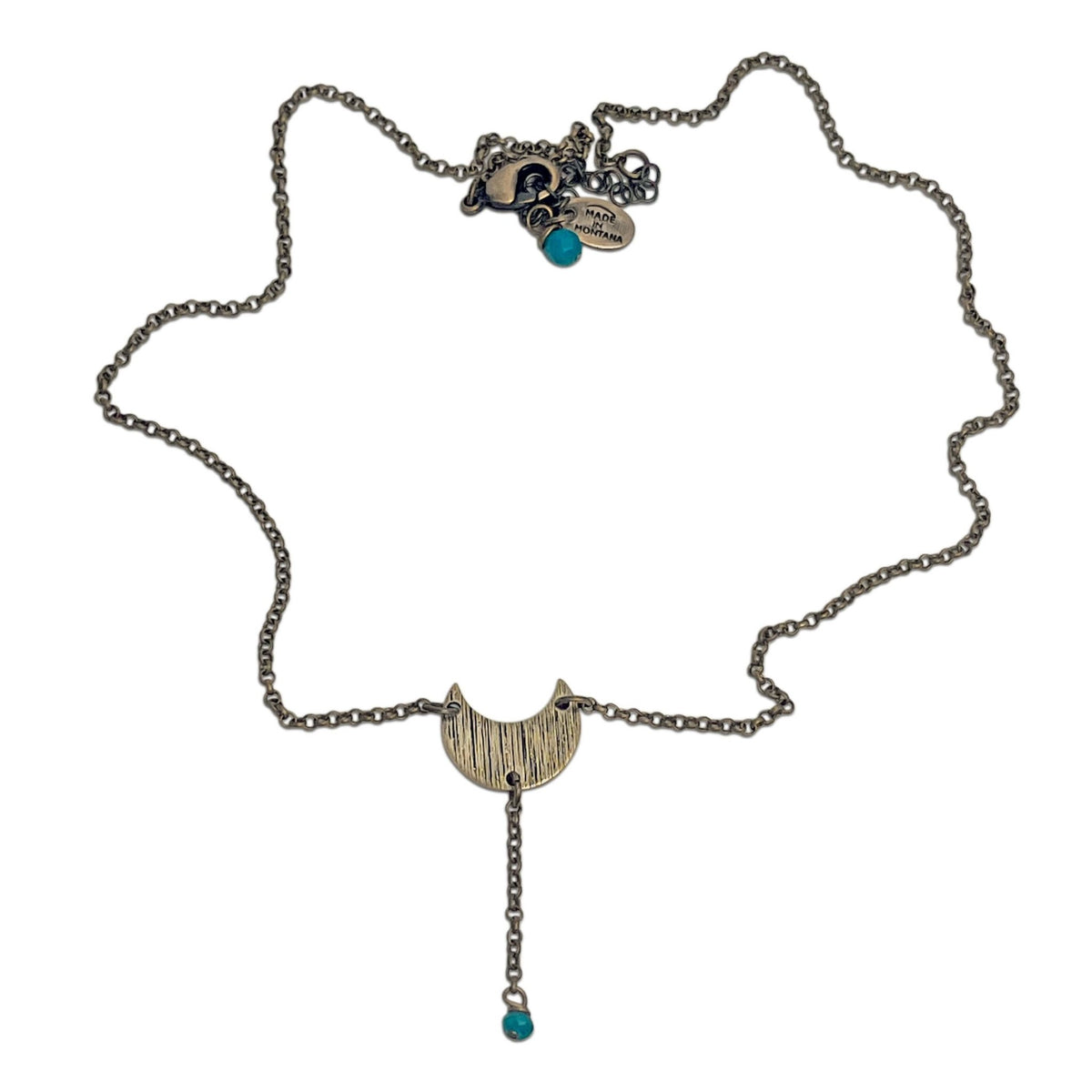 Moonbeam Y Necklace featuring a unique topography design and turquoise accents, handmade in Montana.