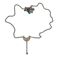 Moonbeam Y Necklace featuring a unique topography design and turquoise accents, handmade in Montana.