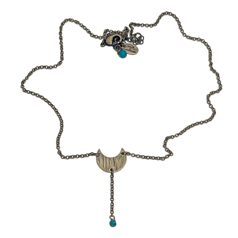 Moonbeam Y Necklace featuring a unique topography design and turquoise accents, handmade in Montana.