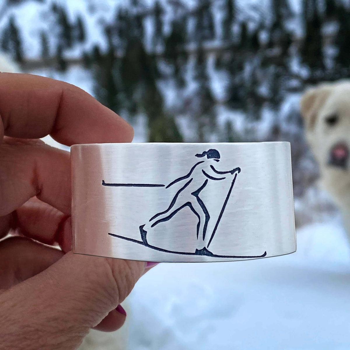Nordic Run Cuff Bracelet showcasing a skier etched design, perfect for outdoor adventurers and cross country skiing enthusiasts.