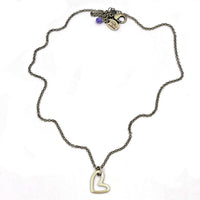 Open Heart Necklace displayed on a white background, showcasing its handmade design and timeless elegance.
