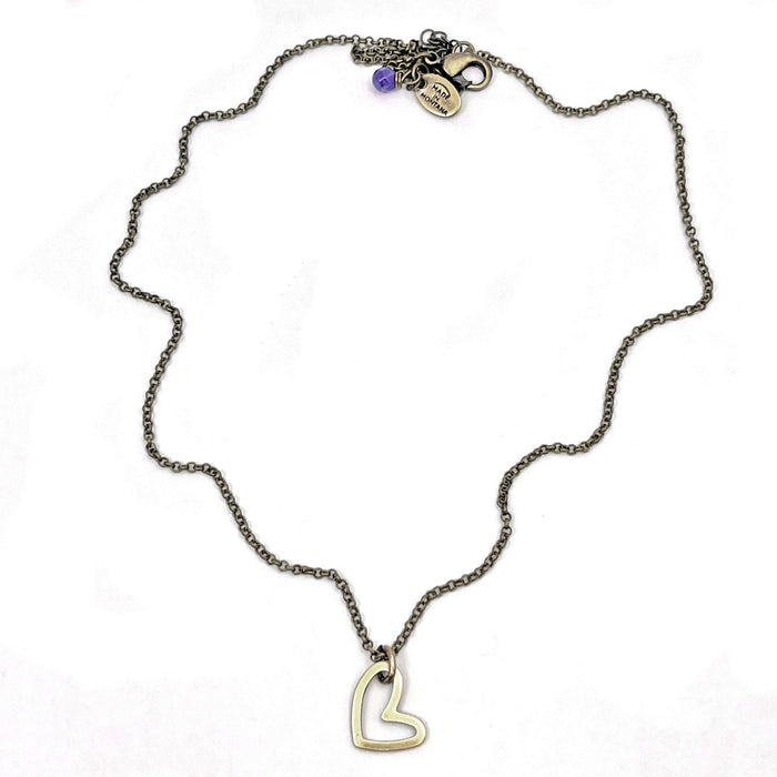Open Heart Necklace displayed on a white background, showcasing its handmade design and timeless elegance.