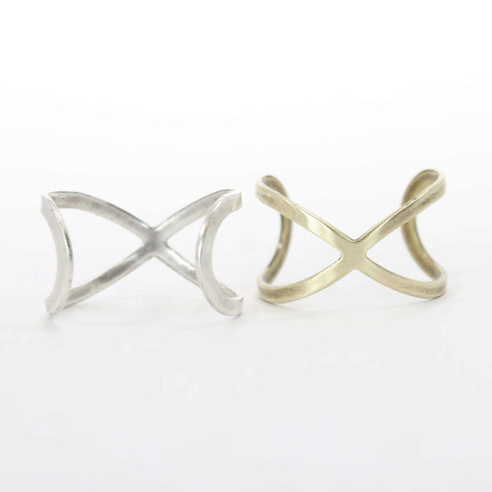 Open Space Adjustable Ring in Matte Silver and Antique Brass finishes, showcasing a unique and classy design.