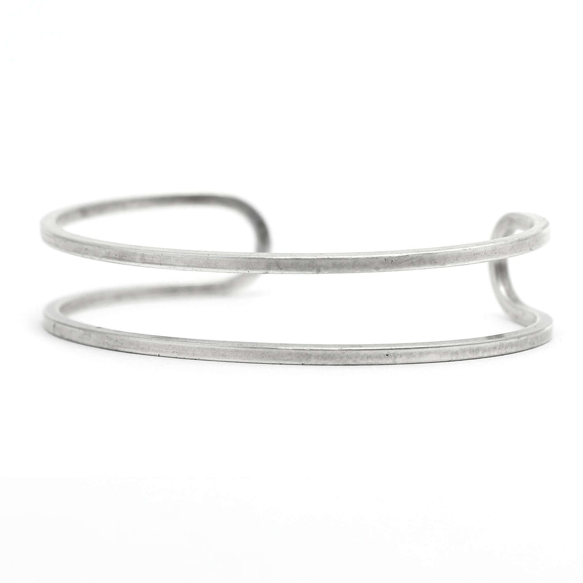 Open Space Cuff Bracelet in Matte Silver finish with a refined, modern design showcasing an elegant open space.